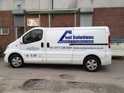 Cool Solutions branded service van — side view with REFCOM badge.